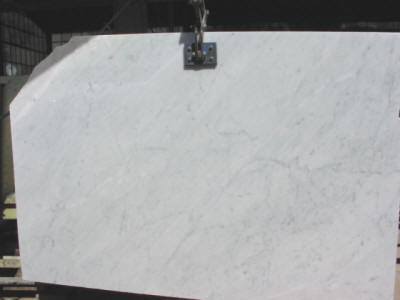 Production and export worldwide of White Carrara Marble C and CD in slabs, tiles, works, stairs, mosaics and cut to size projects by Amso International, Italy - Tel. 0039 0585 835500